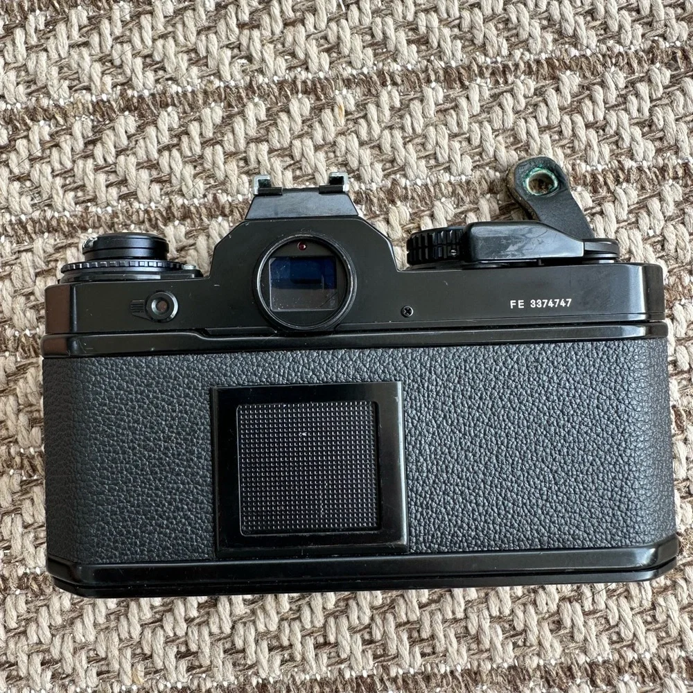 Nikon FE film camera with MD12 attachment grip